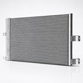 A silver metallic automotive radiator with integrated mounting brackets, shown at a three-quarter angle on a clean white studio background.