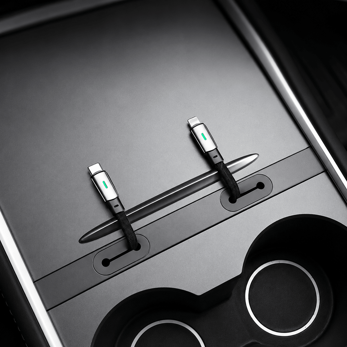 USB-C and Lightning device connectors routed through the console cable slots.