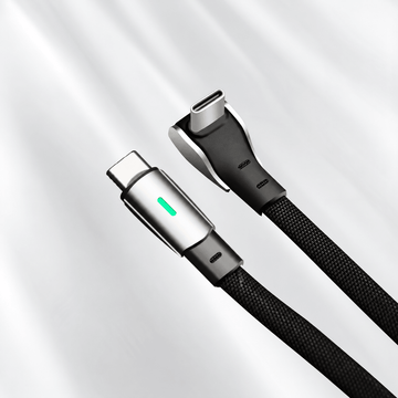 Two USB-C plugs with braided black cable jackets, including a right-angle connector and a green indicator.