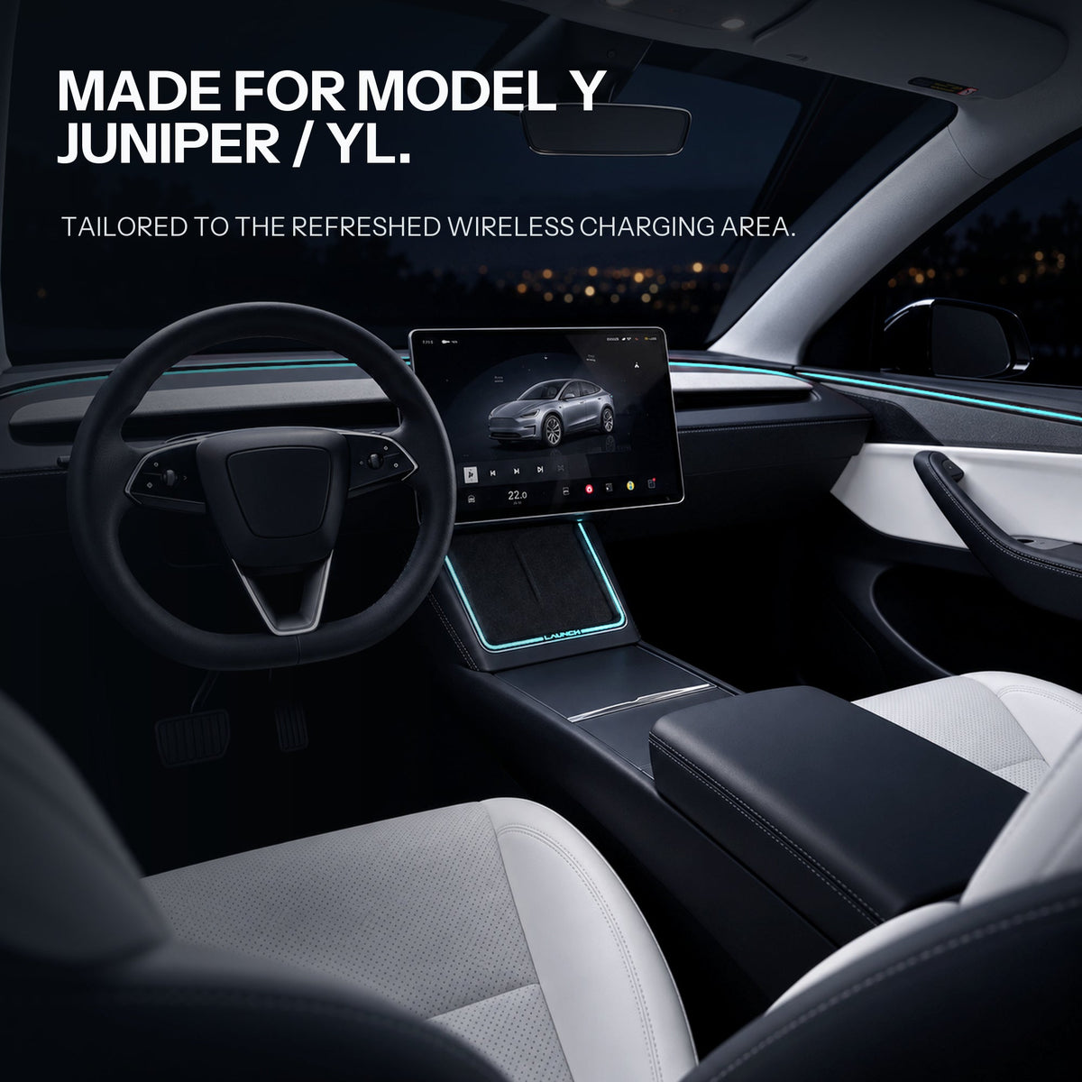 Wide refreshed Tesla cabin view with a cyan light frame around the charging area