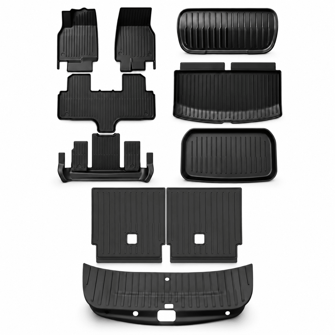 Ten-piece black floor and cargo protection mat set for Model YL laid out on a white background