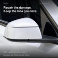 Close-up of a white side mirror housing installed on a Tesla door.