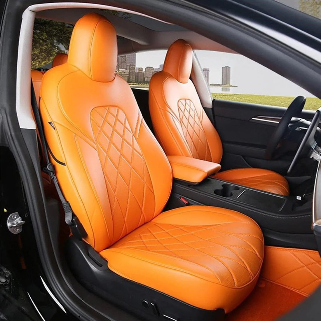 Orange fitted front-seat covers with diamond-quilted center panels, matching headrests and a matching console-armrest cover.