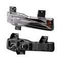 Front and rear views of a lower-light assembly showing the lens, black housing and rear fittings.