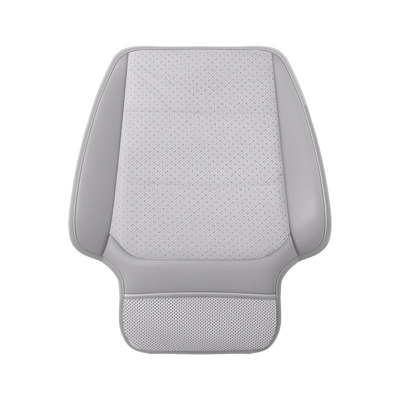 Single white ventilation cushion with a perforated center, smooth side borders and a smaller front section on white.