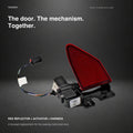 Tesla Model S charge door with integrated hinge actuator and attached harness on graphite background