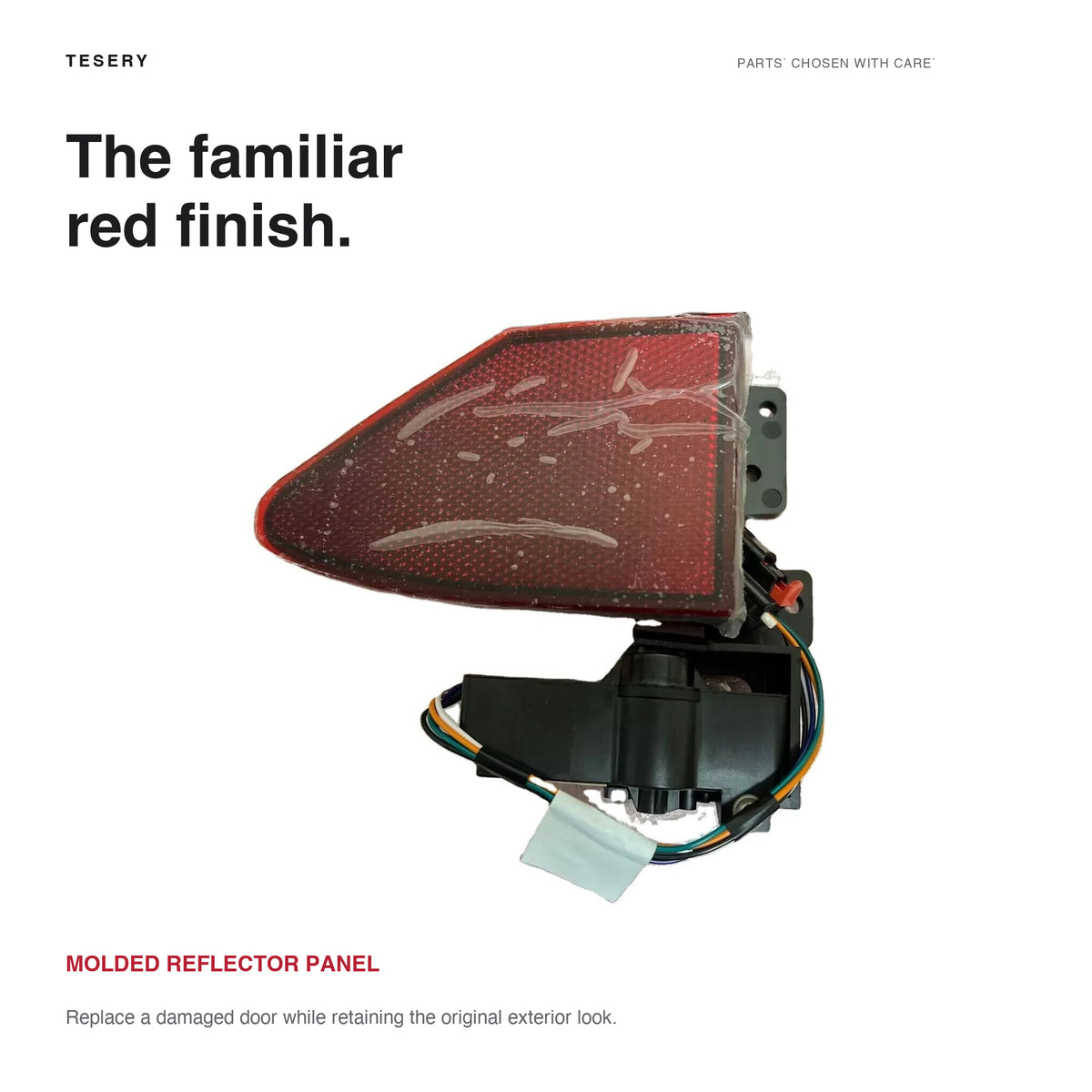 Actual red reflector panel and black hinge actuator of a Model S replacement charge port door