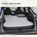 AI-assisted illustration of the NovaPads gray air-foam mattress and dark sidewall in a parked cabin